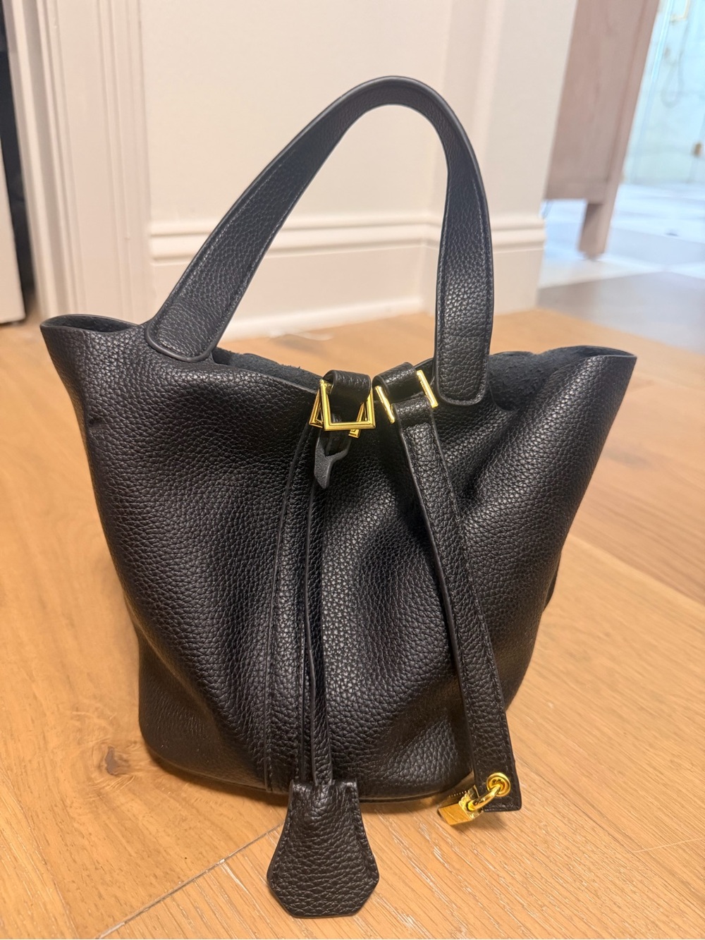 Black Leather Drawstring Tote Bag with Gold Hardware